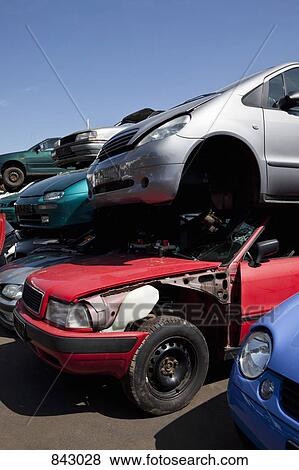 Cars in a junkyard View Large Photo Image Stock Photo - Cars in a junkyard. Fotosearch