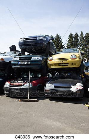 Cars in a junkyard View Large Photo Image Stock Photograph - Cars in a junkyard. Fotosearch