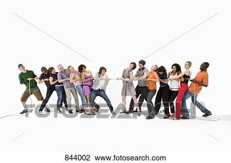 A group of men and women playing tug of war View Large Photo Image Stock Image - A group of men and women playing tug of war. Fotosearch