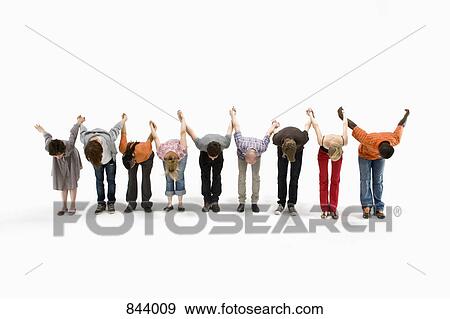 Stock Photo - A group of men and women taking a bow together. Fotosearch