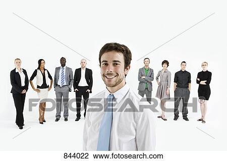 A young professional in front of a row of business people View Large Photo Image Stock Image - A young professional in front of a row of business people. Fotosearch