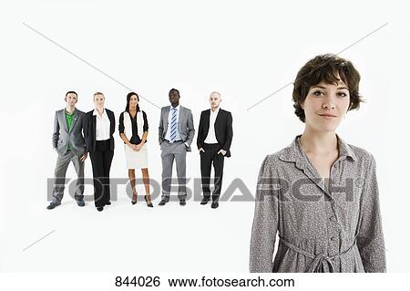 A young professional in front of a row of business people View Large Photo Image Stock Photograph - A young professional in front of a row of business people. Fotosearch