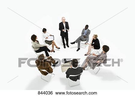 Business people in a meeting View Large Photo Image Stock Photograph - Business people in a meeting. Fotosearch