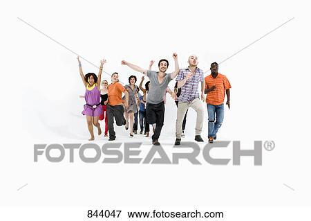 Group of men and women running View Large Photo Image Stock Photo - Group of men and women running. Fotosearch