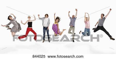 Men and women jumping mid-air together View Large Photo Image Stock Photography - Men and women jumping mid-air together. Fotosearch