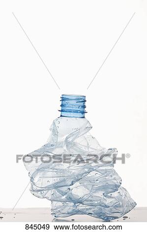 A crumpled plastic water bottle View Large Photo Image Stock Photo - A crumpled plastic water bottle. Fotosearch