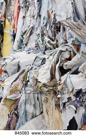 Stock Image - Cardboard at a recycling center, close-up, full frame. Fotosearch