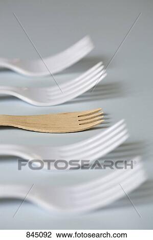 Four plastic forks and one wooden fork View Large Photo Image Stock Image - Four plastic forks and one wooden fork. Fotosearch