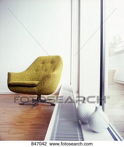 An arm chair next to a window View Large Photo Image Stock Image - An arm chair next to a window. Fotosearch