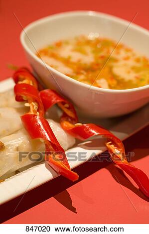 Detail of rice paper rolls and a dipping sauce View Large Photo Image Stock Image - Detail of rice paper rolls and a dipping sauce. Fotosearch