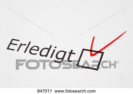 Stock Photo - ERLEDIGT checked on a document. Fotosearch