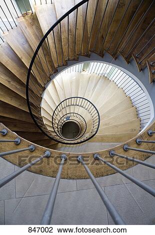 High angle view of a spiral staircase View Large Photo Image Stock Image - High angle view of a spiral staircase. Fotosearch