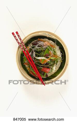 Stock Photography - High angle view of vegetables and rice in a streamer. Fotosearch