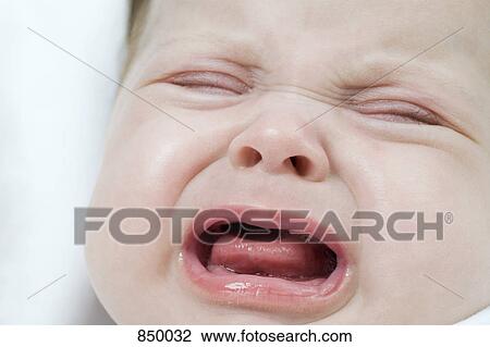A baby girl crying View Large Photo Image Stock Image - A baby girl crying. Fotosearch