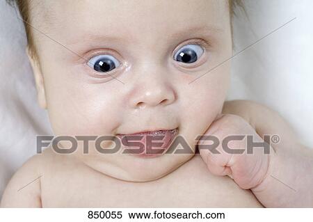 A baby girl making a funny face View Large Photo Image Stock Photography - A baby girl making a funny face. Fotosearch