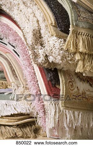 Stock Image - A heap of rugs. Fotosearch