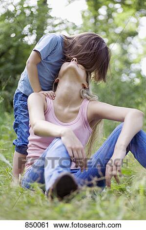 A mother and daughter View Large Photo Image Stock Image - A mother and daughter. Fotosearch