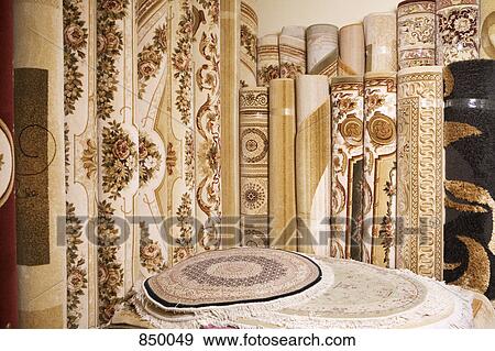 Rolls of rugs and carpets View Large Photo Image Stock Photo - Rolls of rugs and carpets. Fotosearch