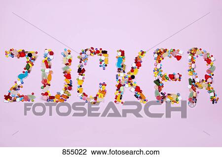 Stock Image - Candies spelling out ZUCKER. Fotosearch