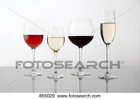 Glasses containing various wines View Large Photo Image Stock Photo - Glasses containing various wines. Fotosearch