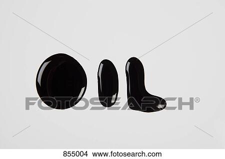 Picture - OIL spelled out in oil. Fotosearch