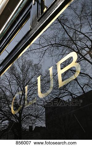 CLUB sign on the window of a building View Large Photo Image Stock Photo - CLUB sign on the window of a building. Fotosearch