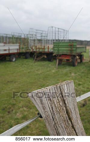 Stock Photo - Detail of a fence post on a farm. Fotosearch