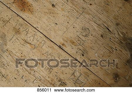 Detail of inscriptions in a wooden table View Large Photo Image Stock Image - Detail of inscriptions in a wooden table. Fotosearch