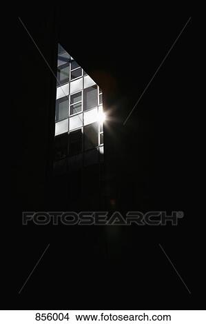 View through an opening of a modern building View Large Photo Image Picture - View through an opening of a modern building. Fotosearch