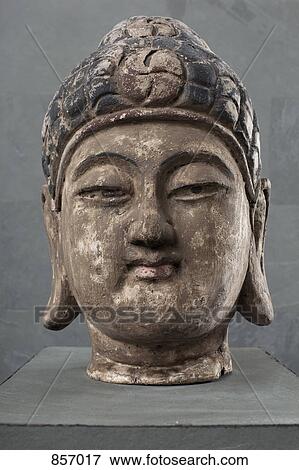 Stock Photo - A Buddha head decoration in a health spa. Fotosearch