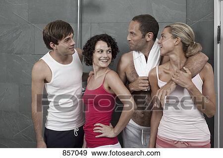 Four friends relaxing in the shower area of a health spa View Large Photo Image Stock Photo - Four friends relaxing in the shower area of a health spa. Fotosearch