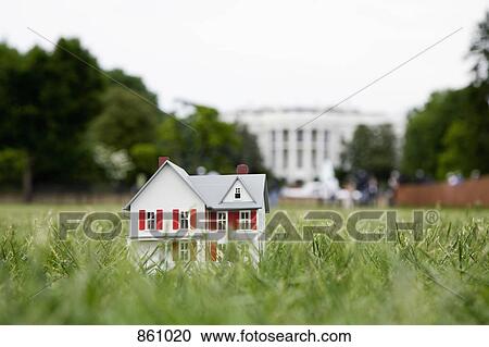A model of a domestic house in front of the White House, Washington DC, USA View Large Photo Image Stock Image - A model of a domestic house in front of the White House, Washington DC, USA. Fotosearch