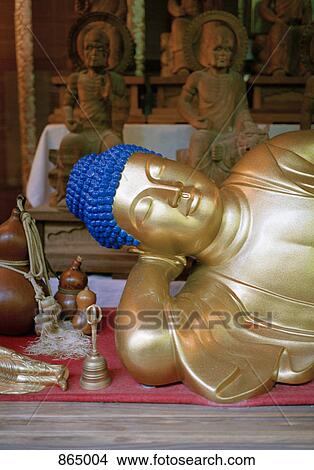 Detail of a gold reclining Buddha statue, Miyajima, Japan View Large Photo Image Picture - Detail of a gold reclining Buddha statue, Miyajima, Japan. Fotosearch