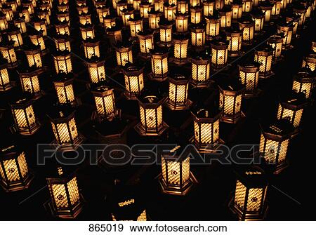 Stock Photo - Illuminated lanterns arranged in rows, Miyajima, Japan. Fotosearch