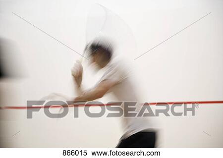 A man playing squash, blurred motion View Large Photo Image Stock Photography - A man playing squash, blurred motion. Fotosearch