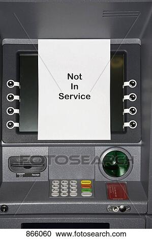 Stock Image - An ATM with a sign stating NOT IN SERVICE. Fotosearch
