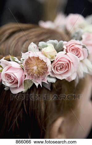 Rear view detail of a girl wearing a floral wreath View Large Photo Image Stock Photograph - Rear view detail of a girl wearing a floral wreath. Fotosearch