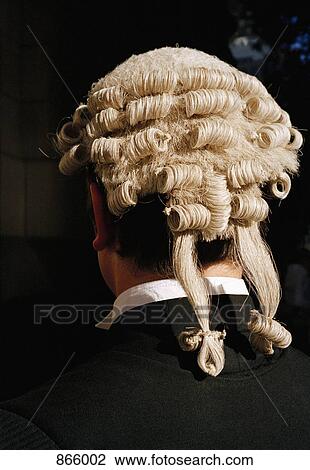 Rear view of a barrister wearing a wig View Large Photo Image Stock Image - Rear view of a barrister wearing a wig. Fotosearch