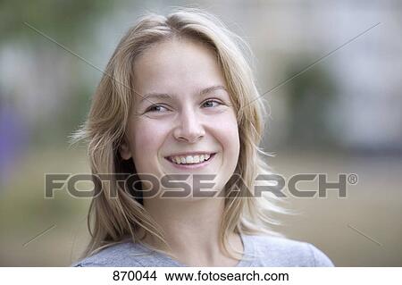 A woman smiling, portrait View Large Photo Image Picture - A woman smiling, portrait. Fotosearch