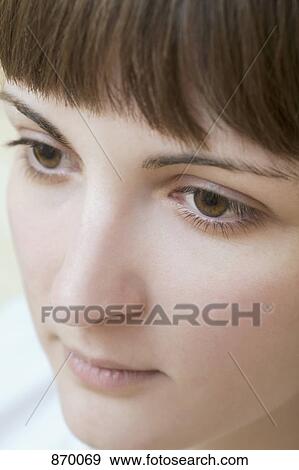 Close-up of a young woman, portrait View Large Photo Image Stock Photo - Close-up of a young woman, portrait. Fotosearch