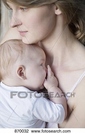 Mother and baby boy, close-up, portrait View Large Photo Image Stock Image - Mother and baby boy, close-up, portrait. Fotosearch