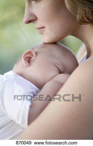 Mother and baby boy, close-up, portrait View Large Photo Image Stock Photo - Mother and baby boy, close-up, portrait. Fotosearch