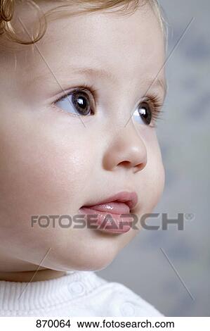 Portrait of a baby girl, studio shot View Large Photo Image Picture - Portrait of a baby girl, studio shot. Fotosearch
