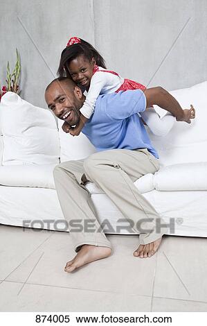 A father playing with his daughter View Large Photo Image Stock Photography - A father playing with his daughter. Fotosearch