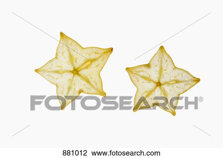 Two slices of an organic carambola on a lightbox View Large Photo Image Stock Image - Two slices of an organic carambola on a lightbox. Fotosearch