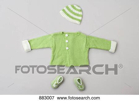 A baby sweater, knit hat and baby booties View Large Photo Image Stock Photo - A baby sweater, knit hat and baby booties. Fotosearch