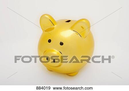 Stock Photo - A yellow piggy bank. Fotosearch