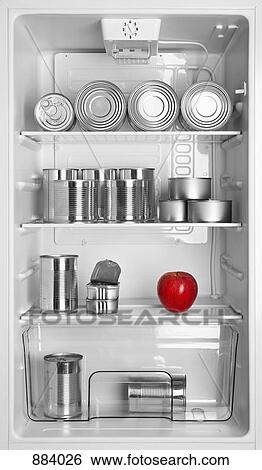Various tin cans and an apple in a fridge View Large Photo Image Stock Photograph - Various tin cans and an apple in a fridge. Fotosearch