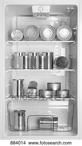 Various tin cans of food in a refrigerator View Large Photo Image Picture - Various tin cans of food in a refrigerator. Fotosearch