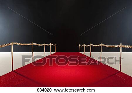 View down red carpet with rope barriers View Large Photo Image Stock Image - View down red carpet with rope barriers. Fotosearch